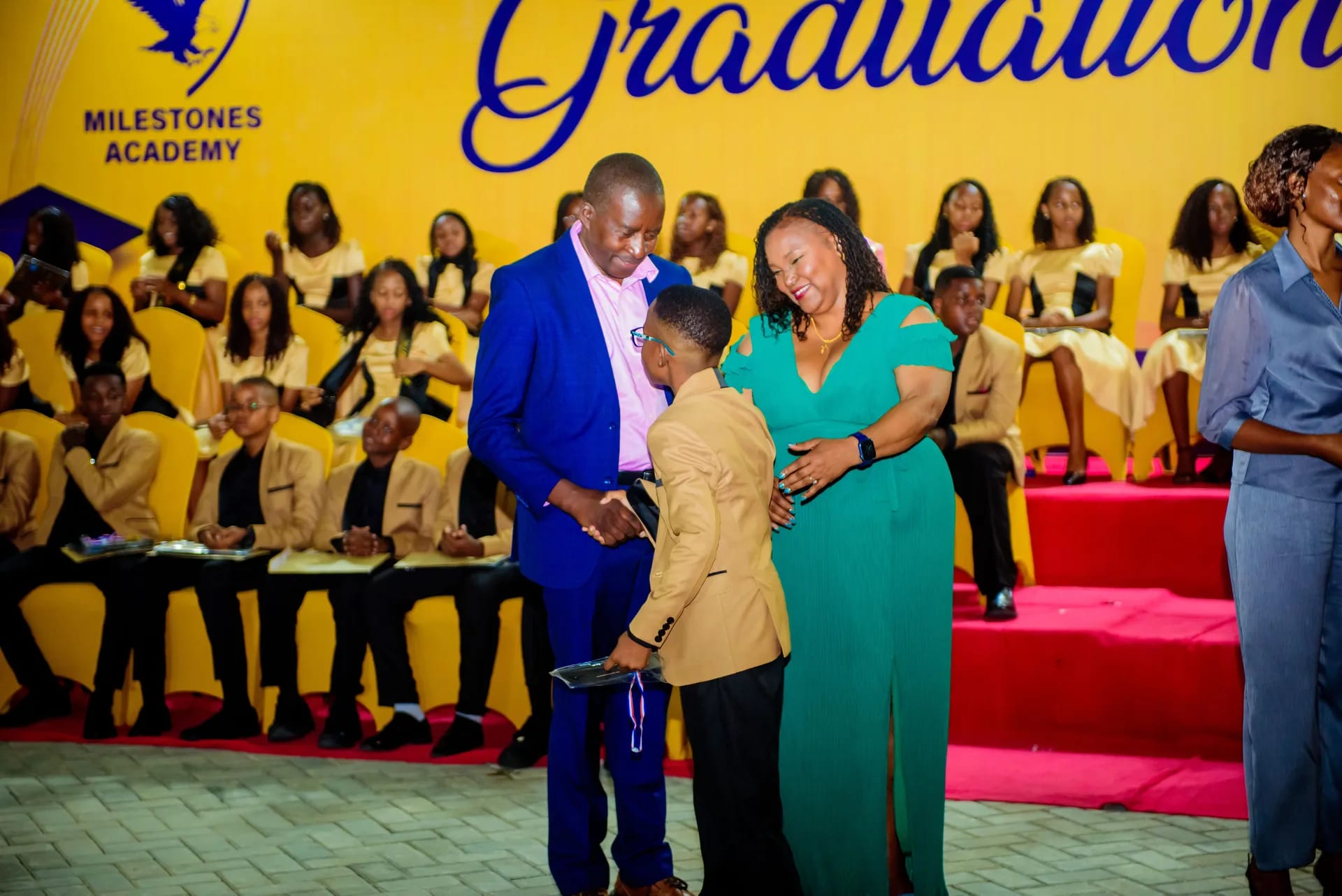 A graduate congratulated by our guests of honour.
