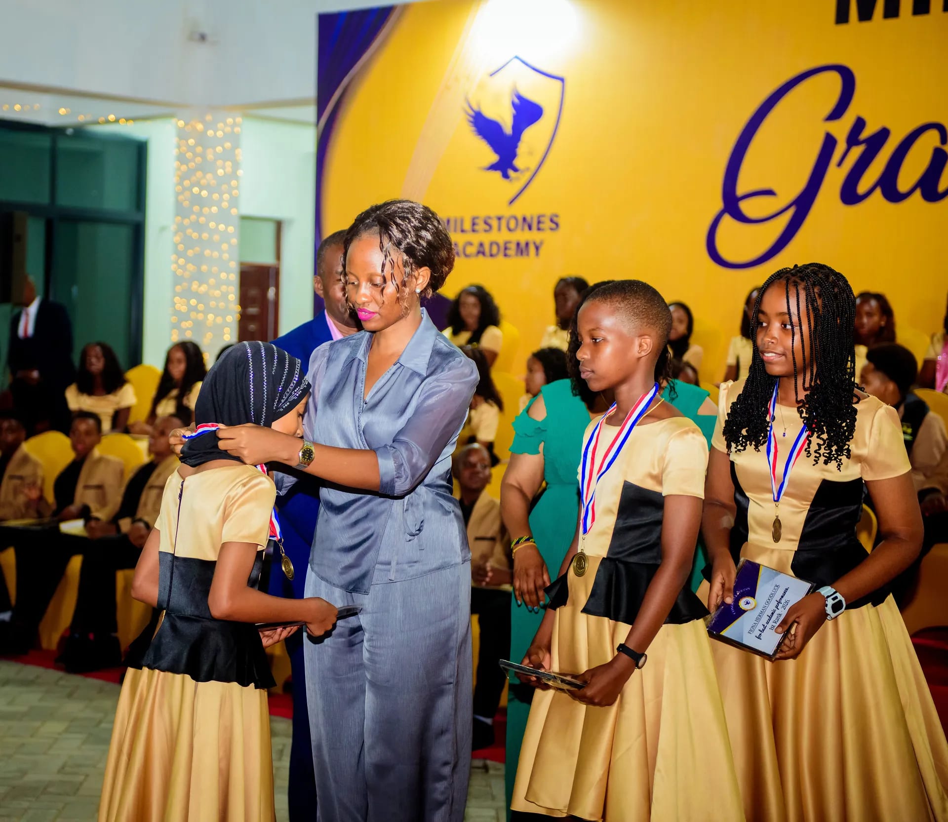 Graduates receiving their medals.
